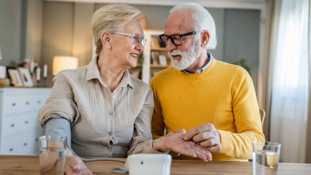 A healthy older couple taking a berberine supplement